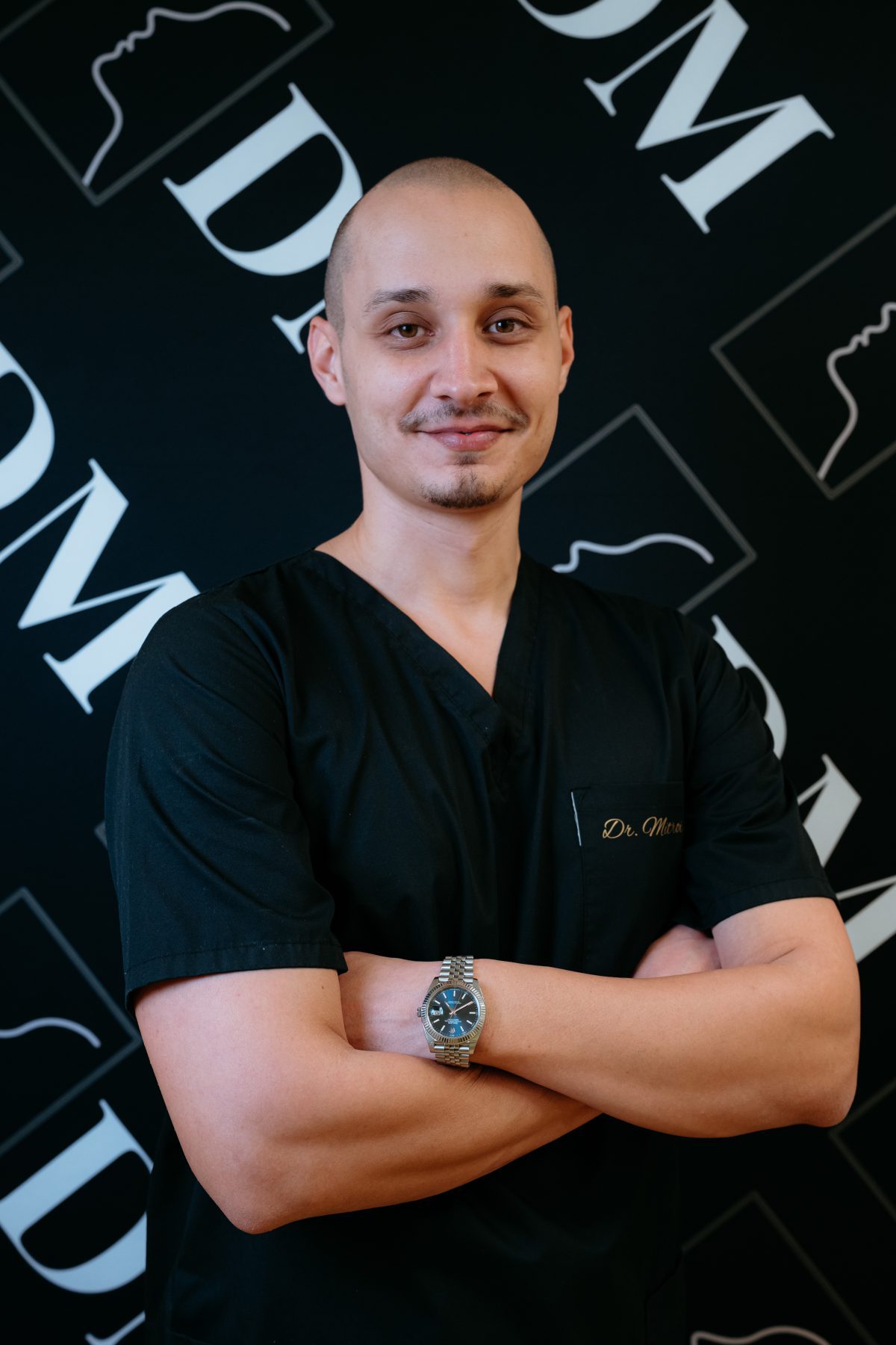 Dr. Mitroi George